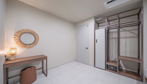 Habitación Signature, varias camas, bañera de hidromasaje, vistas a la ciudad
