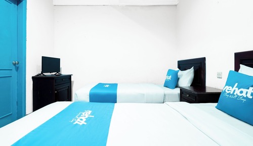 Habitación con 2 camas individuales