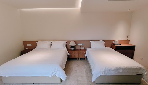 Habitación familiar con 2 camas individuales, vistas al jardín