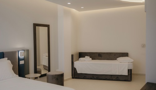 Habitación triple ejecutiva