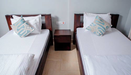 Habitación Deluxe con 2 camas individuales, balcón, vistas al jardín