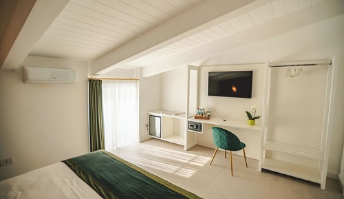 Habitación cuádruple Deluxe