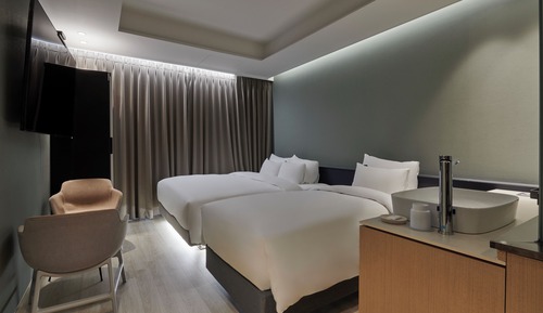 Habitación con 2 camas individuales, vistas a la ciudad