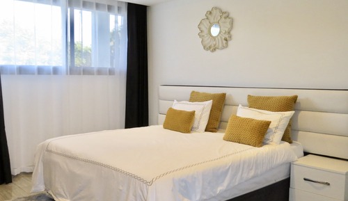 Suite Deluxe, balcón, vistas parciales al mar