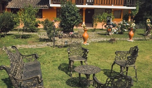 Habitación triple Confort, vistas al jardín