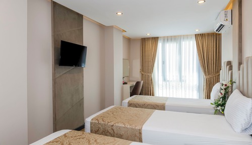 Habitación cuádruple Deluxe, vistas a la ciudad