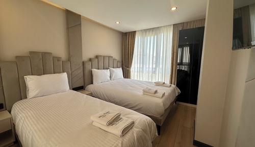 Habitación triple Deluxe, vistas a la ciudad