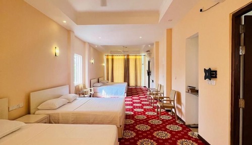 Habitación triple Deluxe, balcón, vistas al jardín