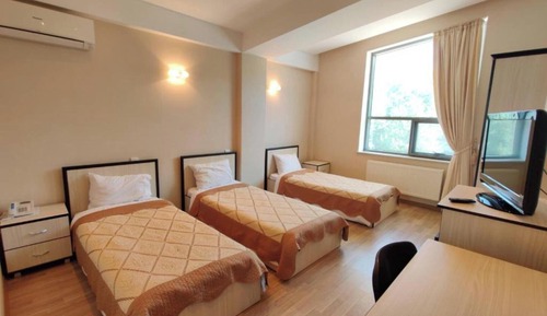 Habitación triple estándar, vistas al jardín
