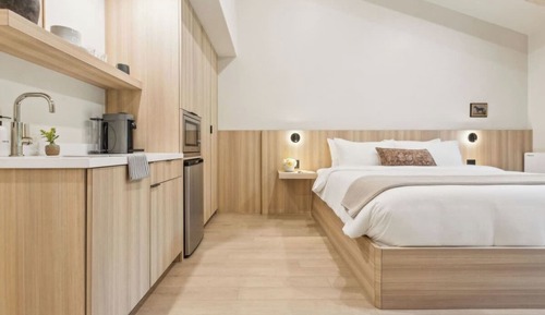 Estudio ejecutivo, 1 cama de matrimonio grande, cocina básica