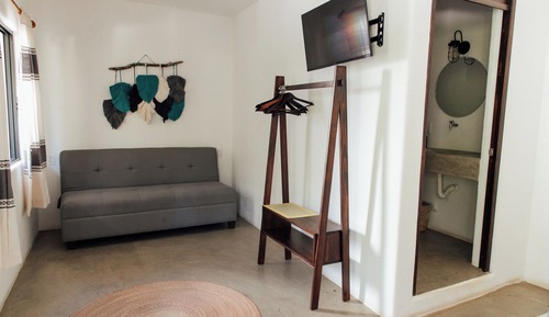 Habitación triple Deluxe, patio, vistas al jardín (1)