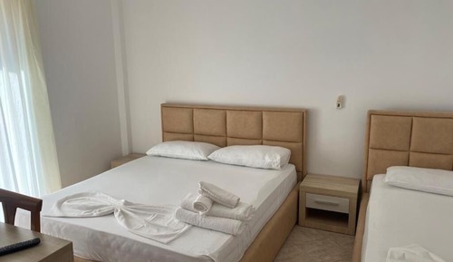 Habitación triple, vistas al mar
