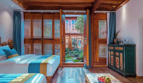 Habitación triple familiar, vistas al jardín