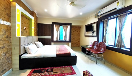 Habitación Deluxe doble, varias camas, Aire acondicionado