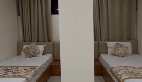 Habitación Deluxe con 2 camas individuales, balcón, vistas a la ciudad
