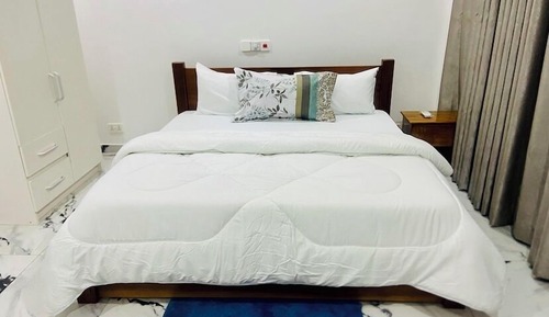 Habitación Deluxe con 2 camas individuales, balcón, vistas a la ciudad