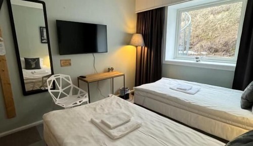 Habitación Confort con 1 cama doble o 2 individuales, vistas a la ciudad