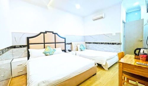 Habitación triple Deluxe, vistas a la ciudad