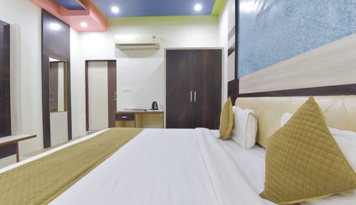 Habitación Deluxe doble, dormitorio mixto, fumadores, Aire acondicionado