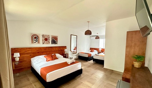 Habitación cuádruple estándar, vistas al jardín
