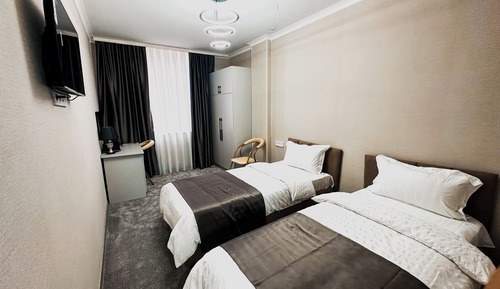 Habitación básica con 1 cama doble o 2 individuales, vistas a la ciudad
