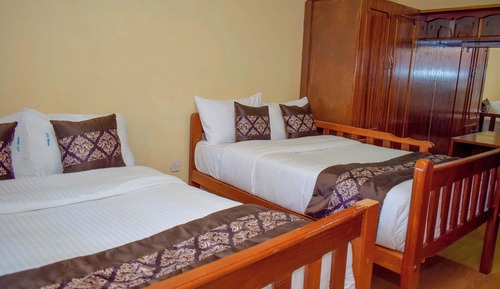 Habitación familiar con 2 camas individuales, vistas al jardín