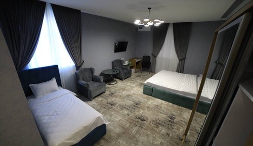 Habitación de lujo con 1 cama doble o 2 individuales