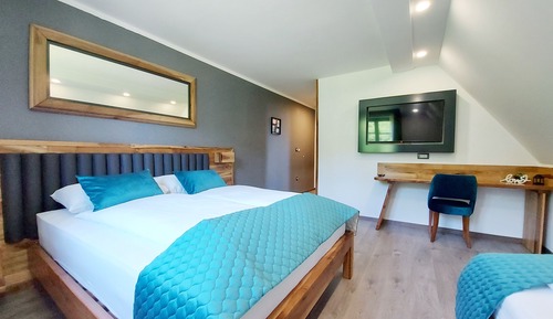 Habitación triple Deluxe, vistas al jardín