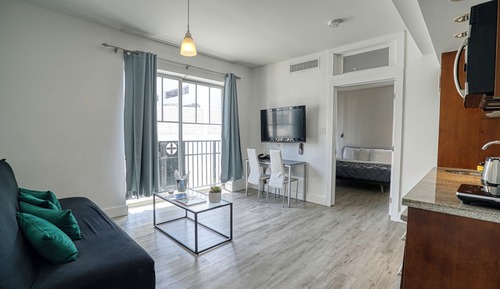 Suite estudio superior, vistas parciales al mar