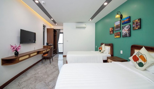 Habitación triple Deluxe, balcón