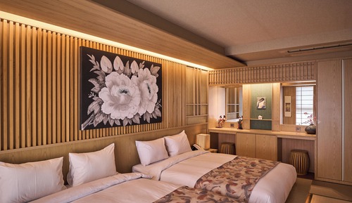 Habitación de estilo japonés con una cama doble o dos camas individuales