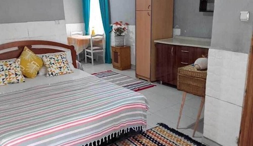 Habitación cuádruple familiar, vistas al jardín