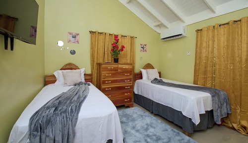 Habitación Confort con 1 cama doble o 2 individuales