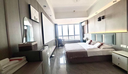 Suite estudio superior, vistas parciales al mar