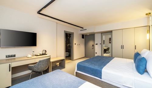 Habitación triple, vistas al mar
