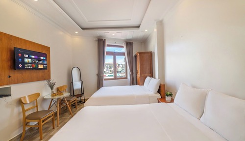 Deluxe Quadruple Room, City View