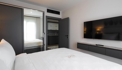 Suite, varias camas, cocina, vistas al mar