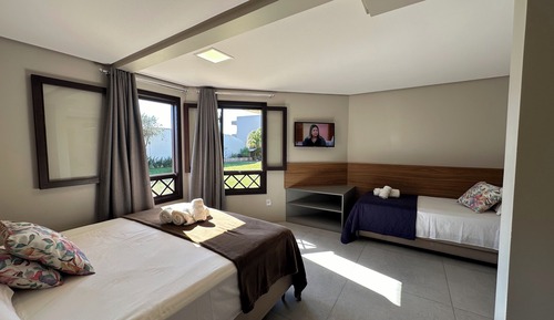 Habitación triple familiar, vistas al jardín
