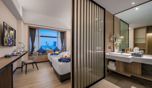 Habitación Signature con 2 camas individuales, vistas al jardín