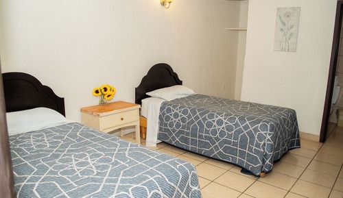 Habitación con 2 camas individuales