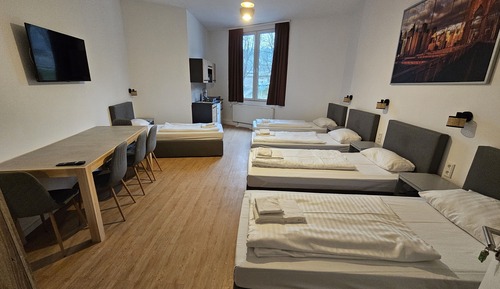 Estudio, varias camas, cocina