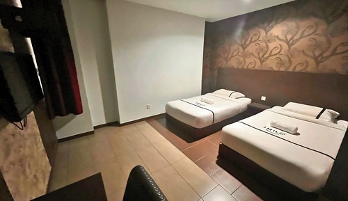 Habitación con 2 camas individuales
