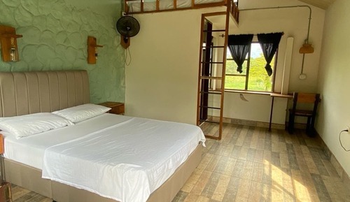 Habitación triple, vistas al jardín