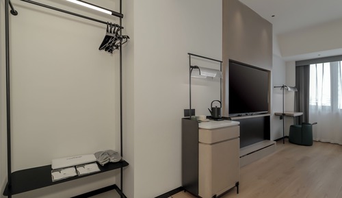 Habitación superior con 2 camas individuales, vistas a la ciudad