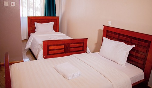 Habitación Confort con 1 cama doble o 2 individuales