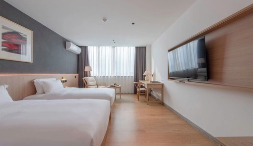 Habitación básica con 2 camas individuales