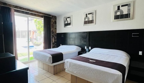 Habitación familiar doble, 1 habitación, vistas al jardín