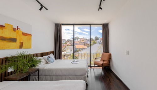 Habitación cuádruple Deluxe, balcón, vistas a la ciudad