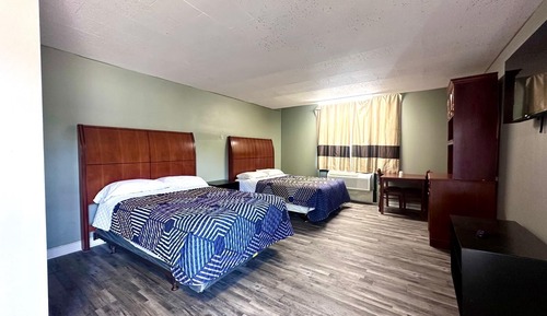 Habitación Confort con 1 cama doble o 2 individuales