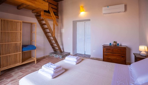 Habitación cuádruple superior, baño privado, en una planta alta